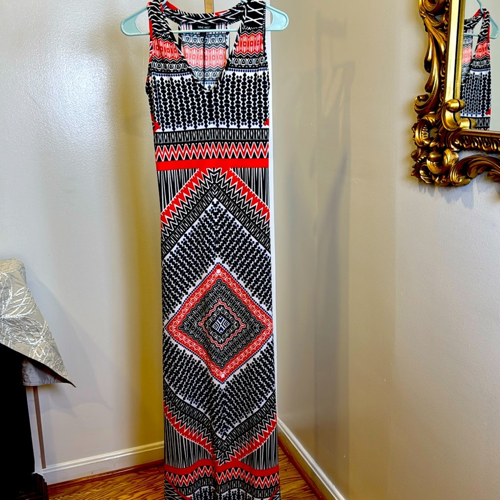 Multi color Sleeveless Maxi Dress with side slit below the knee.